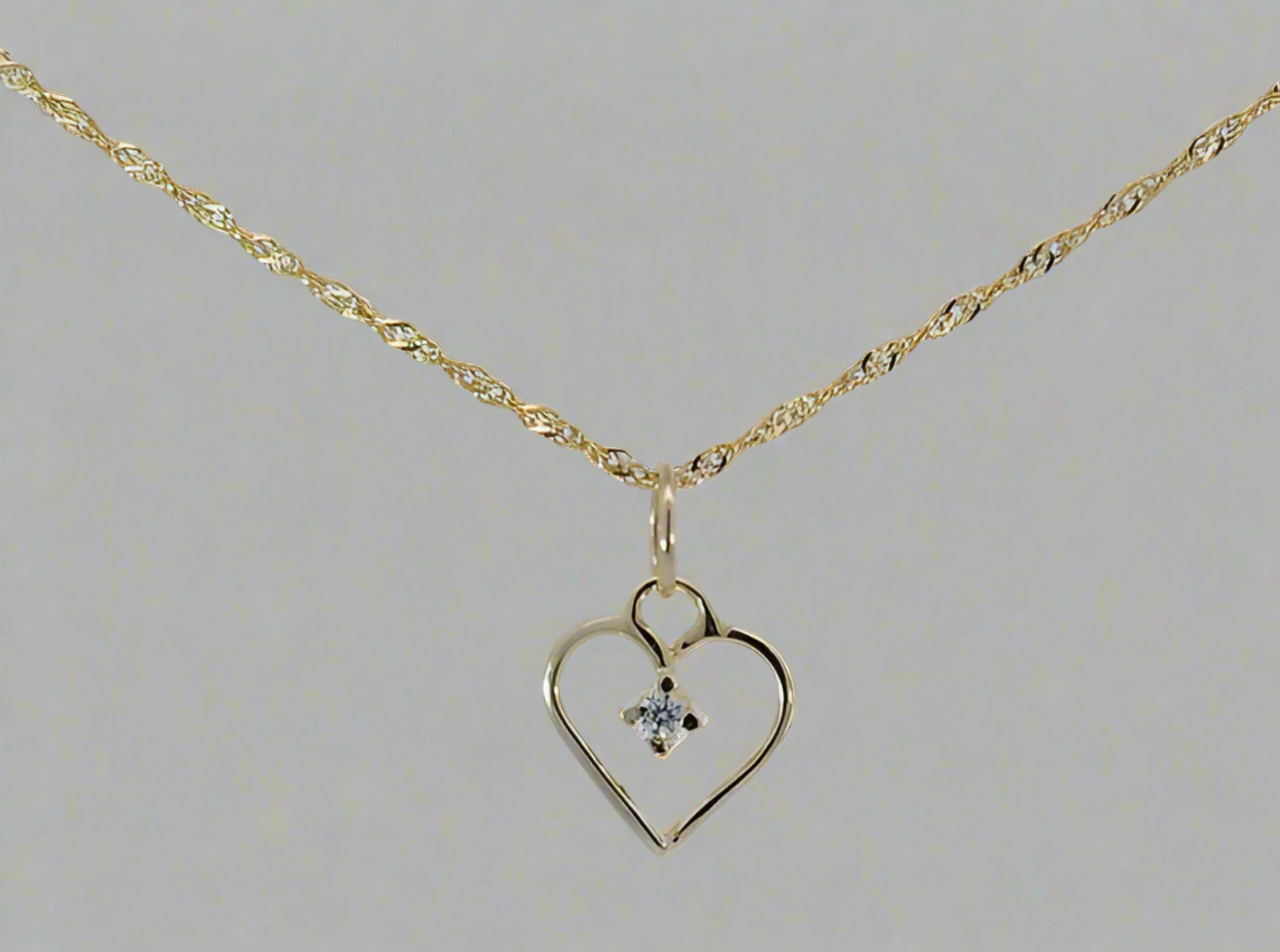 9ct Gold Fancy Open Heart Pendant With Solitaire Cubic Zirconia