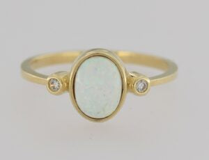 9ct Gold Oval Opal and Cubic Zirconia Dress Ring